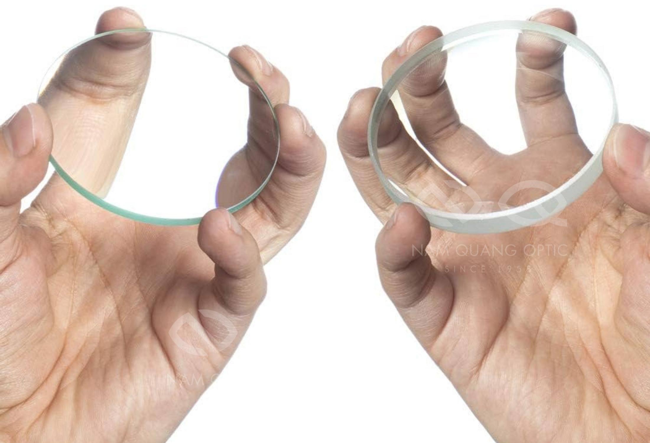 Optician explaining high-index lens options to a customer