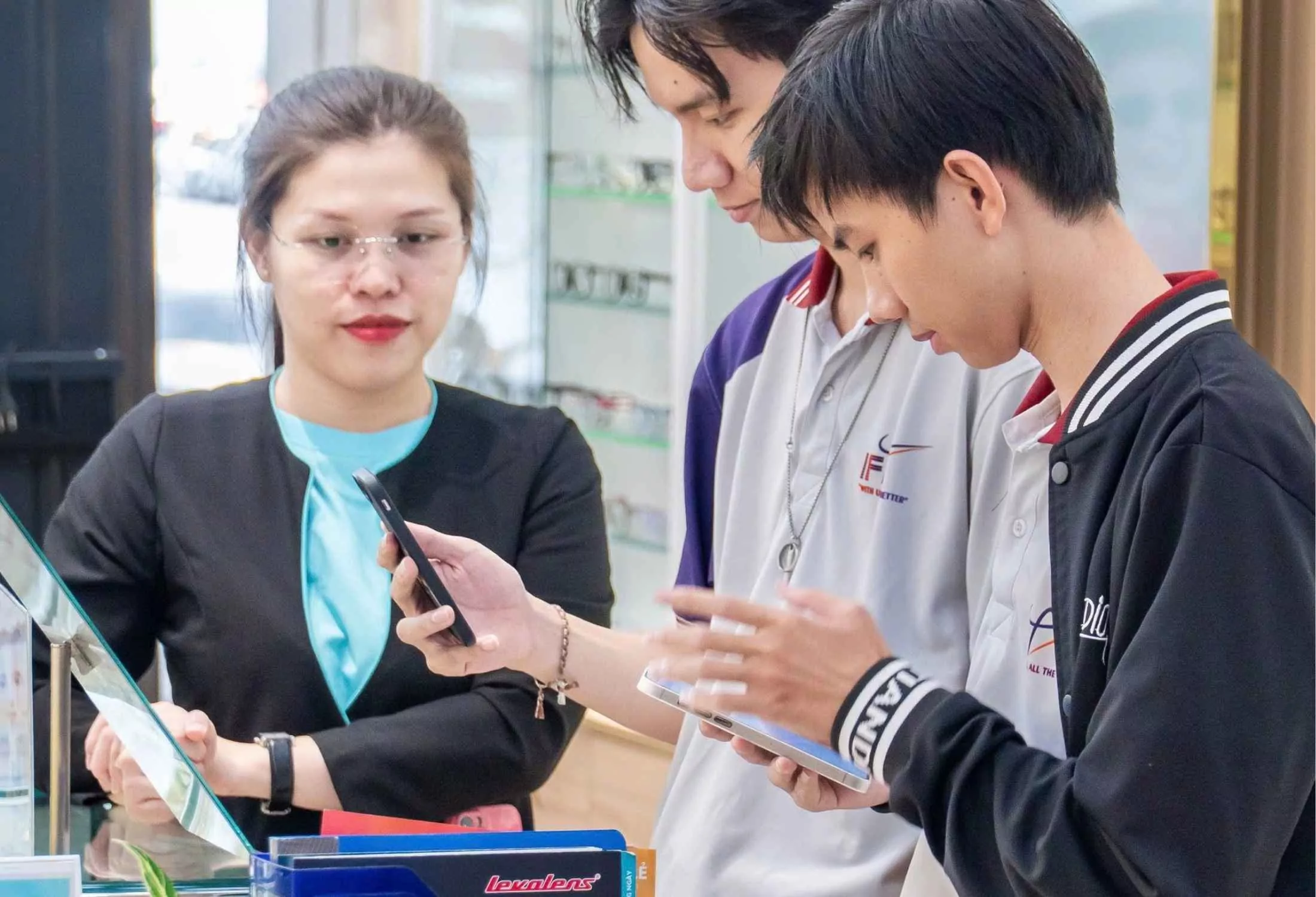 Checking eyewear details before buying at an optical store